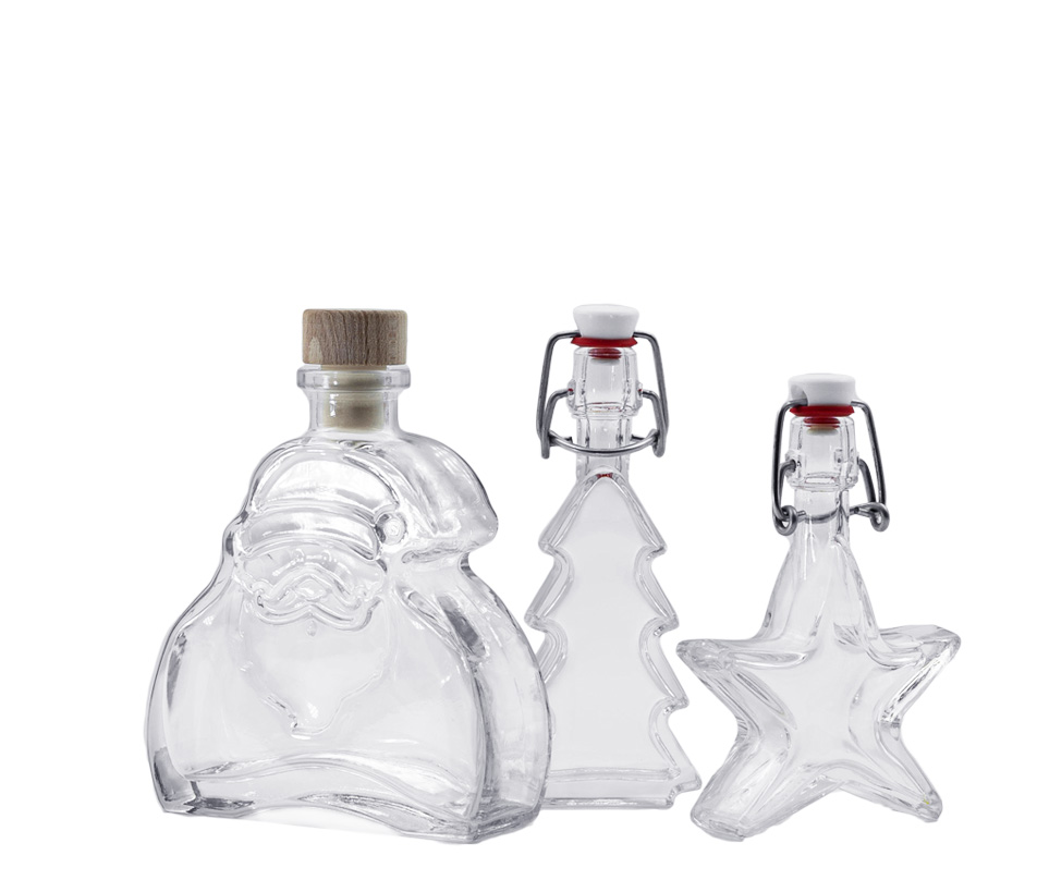 Pudeles Ziemassvētkiem Trīs dekoratīvas pudeles Ziemassvētku sezonai